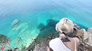 A cute girlfriend passionately sucks dick on the ocean shore