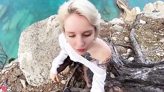 A cute girlfriend passionately sucks dick on the ocean shore