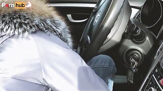 The guy unbuttoned his pants because of the heat in the car