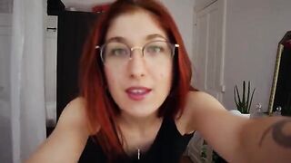 Redhead Trish Collins tries on sexy lingerie for her boyfriend