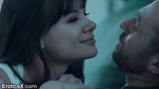 The cute couple have passionate and sensual sex in the kitchen