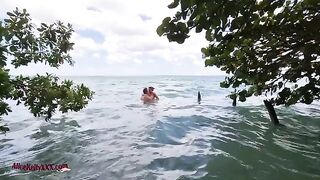 A couple has an amazing and passionate sex in the blue lagoon