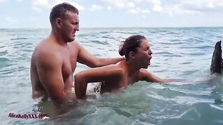A couple has an amazing and passionate sex in the blue lagoon