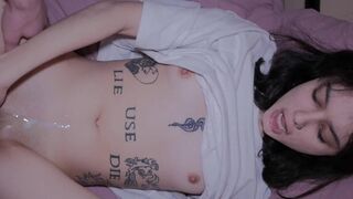 A beautiful girl with a tattoo gets cum on her face and inside