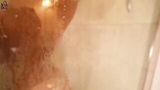 A hot young girl has fun with a big dildo in the shower