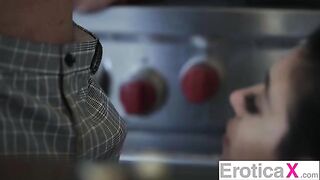 The cute couple has passionate and sensual sex in the kitchen
