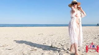 A couple gets naked and fucks for the first time on a public beach