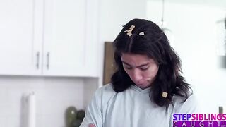 The guy is having fun with the sexy mini-skirt of his stepsister in the kitchen