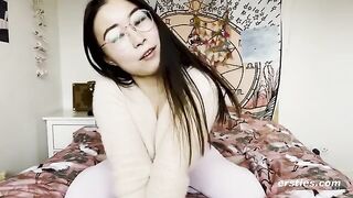 A young Chinese beauty playing with herself and her vibrator in a steamy homemade video