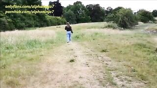 A girl is having fun with a guy in the park and gets a cumshot on her face