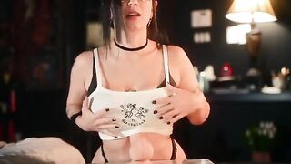 A big-breasted goth girl plays with her new sex toy from Adam & Eve