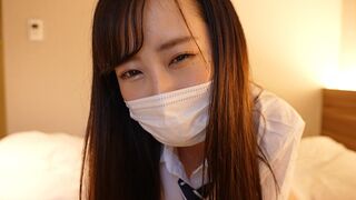 A Japanese girl in a sailor suit masturbating with her hand
