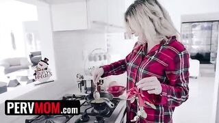 Cory Chase, the busty step mom, presents a Christmas gift to her stepson