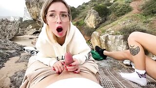 Two pretty girls enjoy sex on the beach during vacation