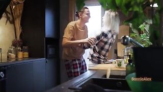 A couple has an unexpected encounter in the kitchen, getting intimate
