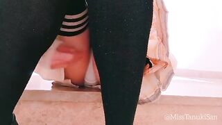 A naughty Japanese schoolgirl removes her panties and indulges in solo play at her desk