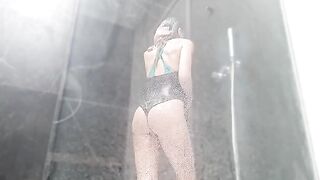 The girl came to the shower and started to masturbate, soaking wet pussy
