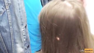 The petite girl was almost caught while giving a blowjob in a shop changing room