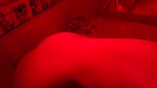 A blonde is indulging in bathroom fun with toys and more