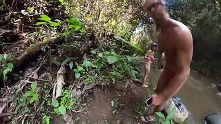 Couple making love right in the jungle river
