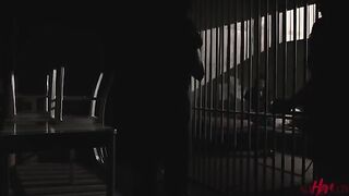 Two girls are having fun behind bars in this steamy tale