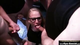 A huge load of sperm on the face of an amateur model in a gangbang