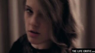 A girl with big natural tits plays with milk on her boobs