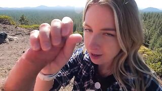 Blonde babe got a dick in her mouth while walking on the mountain