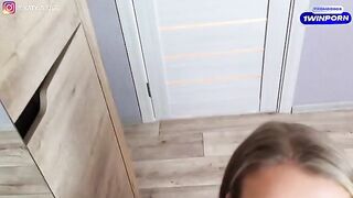 A girl in sexy underwear is making a wet splashing video