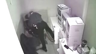 A secret camera has photographed the intimate moments of two lovers at work