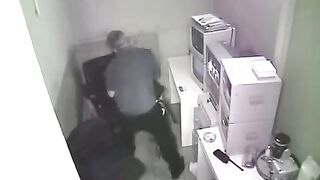 A secret camera has photographed the intimate moments of two lovers at work