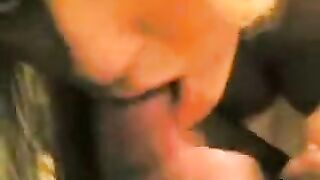 A blowjob from a girlfriend in a homemade setting, captured in intimate detail