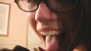 The fool is happy in glasses, getting his dick sucked