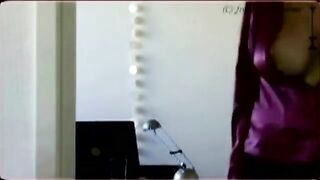 Looking through the keyhole at a girl with big tits