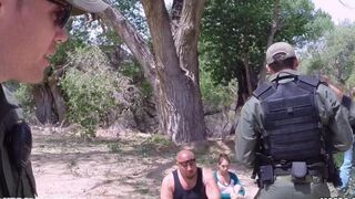 A hot grandma is getting fucked by a soldier in the woods