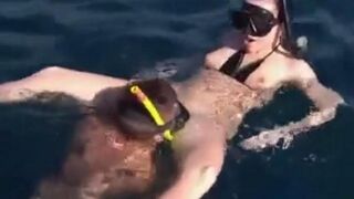 Underwater sex of two aqua sexy girls at the bottom of the sea