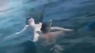 Underwater sex of two aqua sexy girls at the bottom of the sea