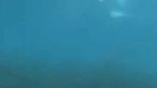 Underwater sex of two aqua sexy girls at the bottom of the sea