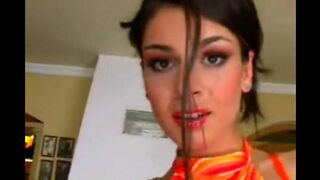 Beautiful woman masturbating on a leather chair