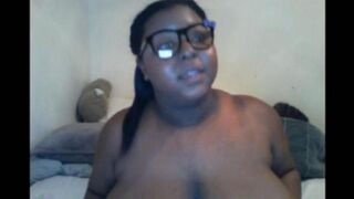 A black woman with big natural boobs closed the camera during milking