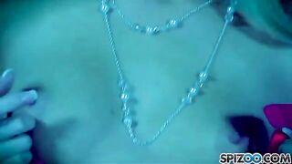 A blonde woman caresses herself with a big dildo and brings herself to mind-blowing pleasure