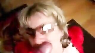 A woman with big tits dressed in latex and sucks cock like a slut