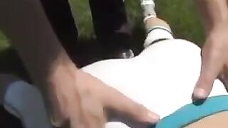 A cum shot on the tits of a busty brunette woman