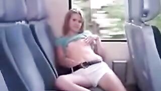 On the bus, ironing her panties with a lift up the skirt