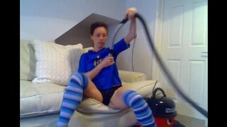 Babe came from her work and began to play with a vacuum cleaner