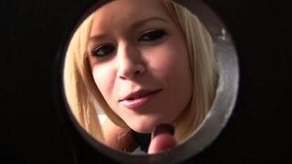 A blonde woman pulled a cock through the hole in the toilet bowl