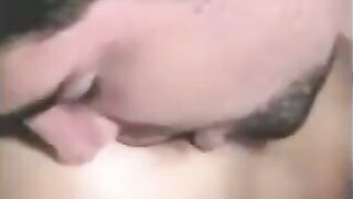 A man was fucking a strapon, while another girl was fingering his dick