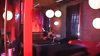 Ebony woman in latex corset, riding with passion and intense rhythm