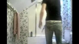 A spy camera in the toilet caught intimate moments of a curious teen