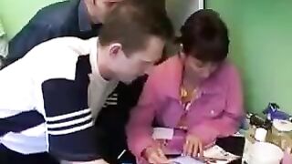 A Russian woman with big natural boobs has sex with four men